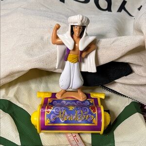 Aladdin Action Figure with Purple and Yellow Magic Carpet